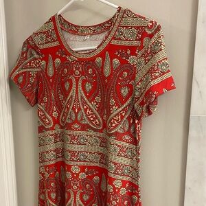 Tshirt dress.  Flared skirt.  Poly spandex. Great run around or travel dress!